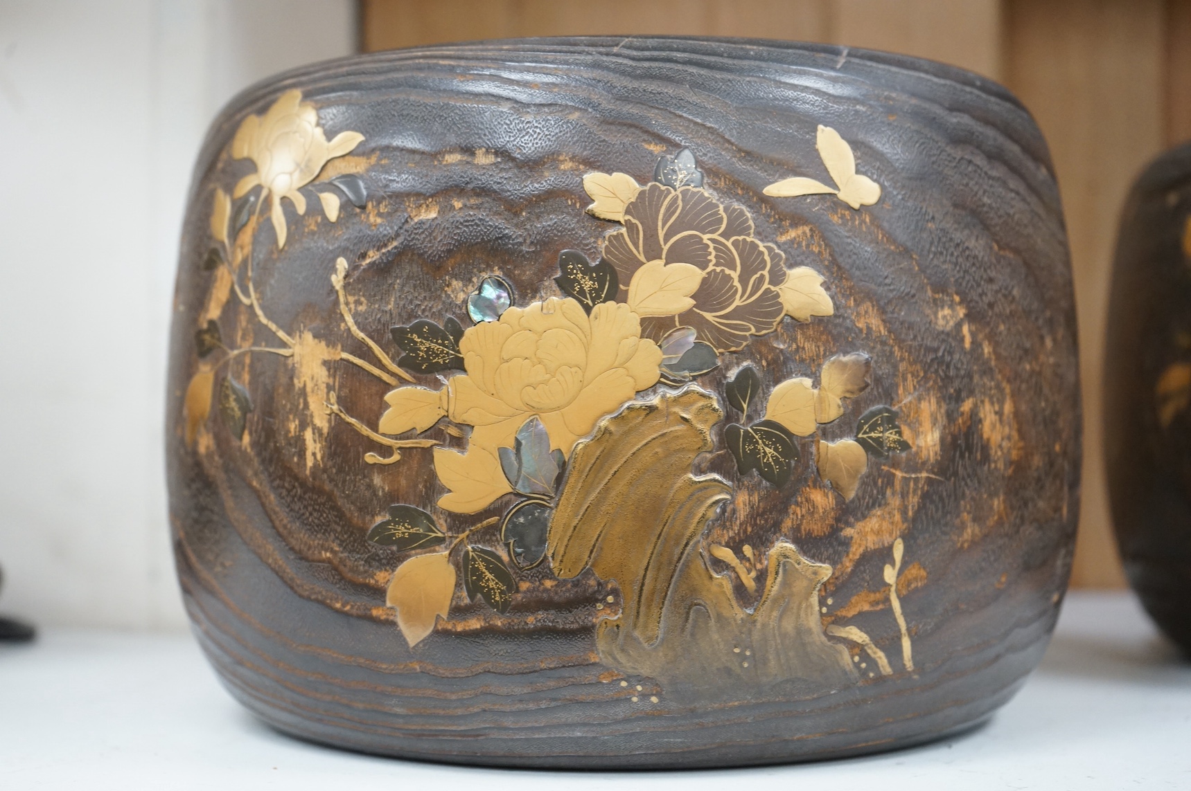A pair of Japanese hibachi bowls with lacquered decoration and abalone inlay, label to the bases, 29cm in diameter. Condition - fair, some inlay missing